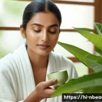 Home 22 천연화장품 발효 성분 효과 - A serene and elegant skincare scene featuring a young Indian woman with clear, glowing skin applying...
